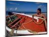 Fisherman Tends His Boat on the Beach, Isla Margarita, Venezuela-Greg Johnston-Mounted Photographic Print