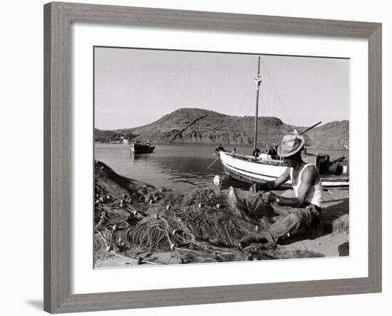 Fisherman Tends to His Nets in Greece-null-Framed Photographic Print