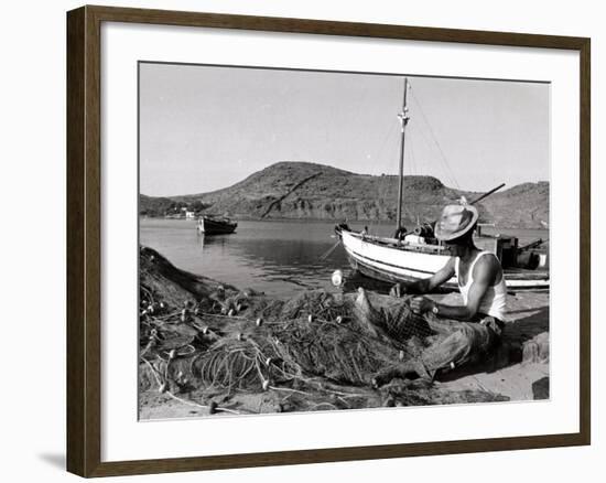 Fisherman Tends to His Nets in Greece-null-Framed Photographic Print