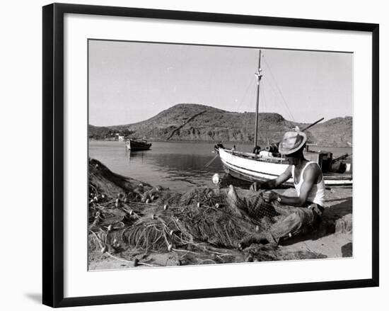 Fisherman Tends to His Nets in Greece-null-Framed Photographic Print