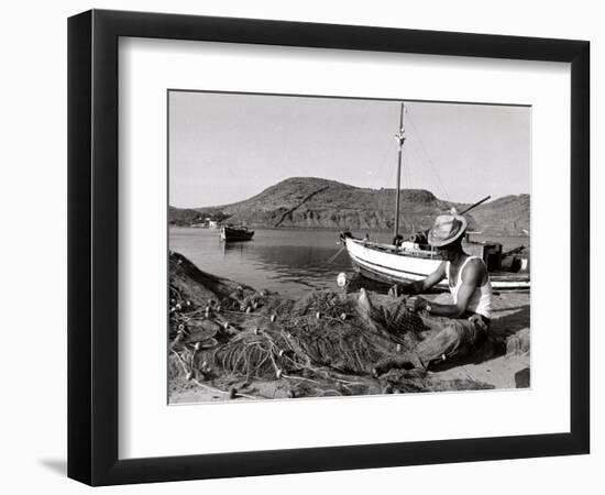 Fisherman Tends to His Nets in Greece-null-Framed Photographic Print