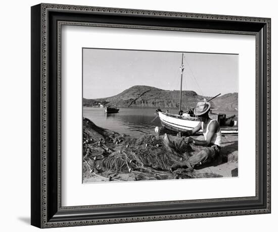 Fisherman Tends to His Nets in Greece-null-Framed Photographic Print