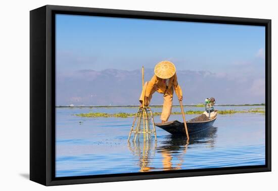 Fisherman with traditional conical net on boat, Lake Inle, Shan State, Myanmar (Burma)-Jan Miracky-Framed Premier Image Canvas