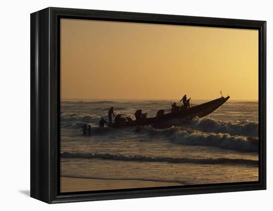 Fishermen Launch their Boat into the Atlantic Ocean at Sunset-Amar Grover-Framed Premier Image Canvas