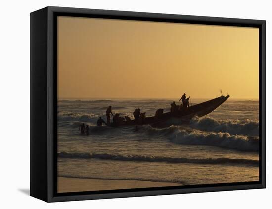 Fishermen Launch their Boat into the Atlantic Ocean at Sunset-Amar Grover-Framed Premier Image Canvas