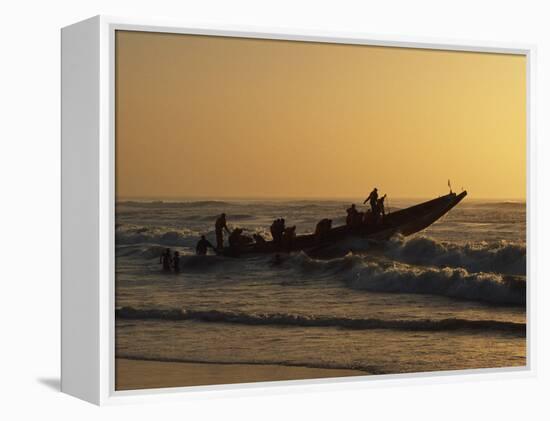 Fishermen Launch their Boat into the Atlantic Ocean at Sunset-Amar Grover-Framed Premier Image Canvas