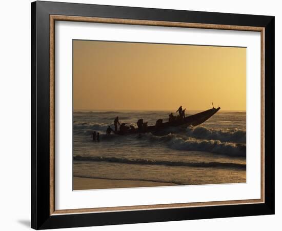 Fishermen Launch their Boat into the Atlantic Ocean at Sunset-Amar Grover-Framed Photographic Print