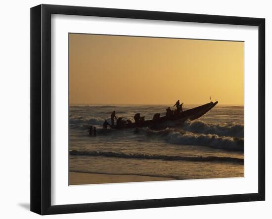 Fishermen Launch their Boat into the Atlantic Ocean at Sunset-Amar Grover-Framed Photographic Print