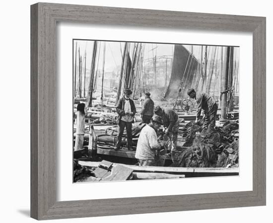 Fishermen Overhaul the Nets on Their Boats at Scarborough Yorkshire-Graystone Bird-Framed Photographic Print