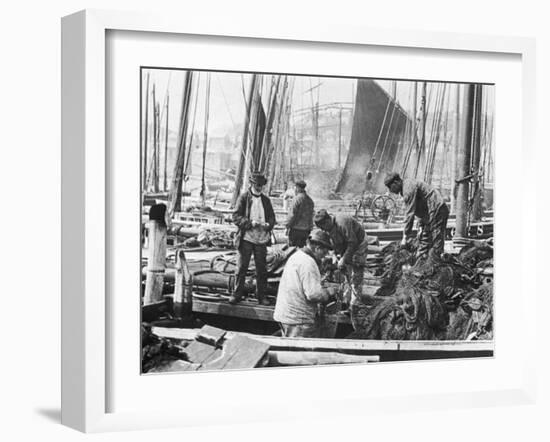 Fishermen Overhaul the Nets on Their Boats at Scarborough Yorkshire-Graystone Bird-Framed Photographic Print