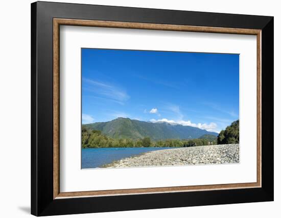 Fishermen walking along a shingle beach next to the trout-filled Puelo River in Northern Patagonia,-Alex Robinson-Framed Photographic Print