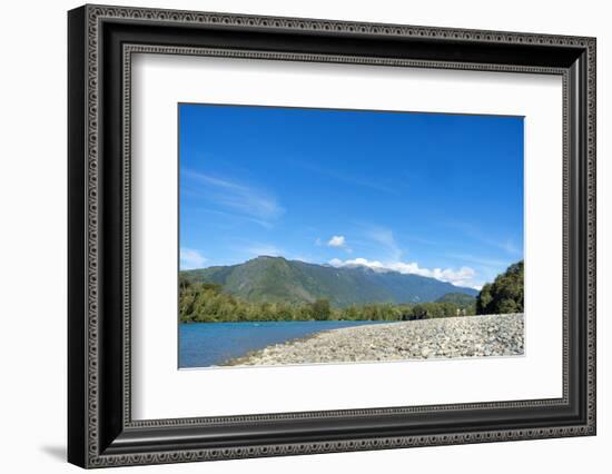 Fishermen walking along a shingle beach next to the trout-filled Puelo River in Northern Patagonia,-Alex Robinson-Framed Photographic Print