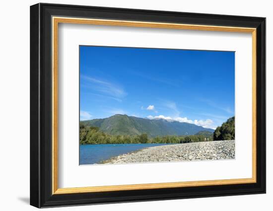 Fishermen walking along a shingle beach next to the trout-filled Puelo River in Northern Patagonia,-Alex Robinson-Framed Photographic Print