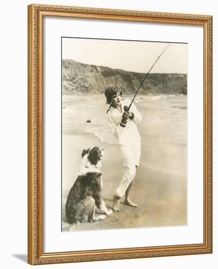 Fishing at the Beach with Her Dog-null-Framed Photo