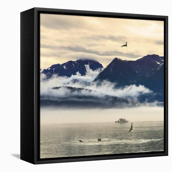 Fishing boat in Kenai Peninsula surrounded by mountains and wildlife-Janet Muir-Framed Premier Image Canvas