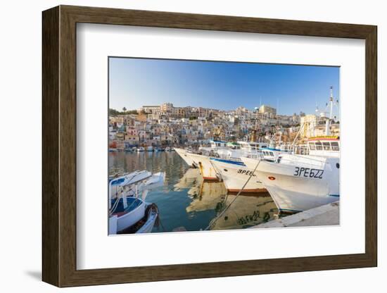 Fishing boats moored in the harbour surrounded by blue sea and the old town, Sciacca, Province of A-Roberto Moiola-Framed Photographic Print