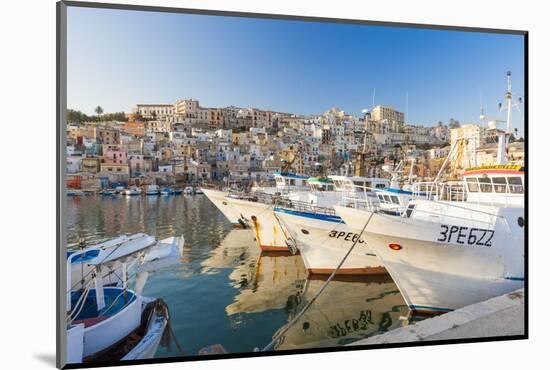 Fishing boats moored in the harbour surrounded by blue sea and the old town, Sciacca, Province of A-Roberto Moiola-Mounted Photographic Print