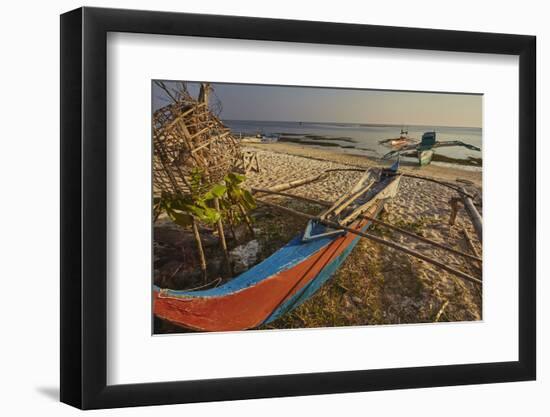 Fishing boats pulled up onto Paliton beach, Siquijor, Philippines, Southeast Asia, Asia-Nigel Hicks-Framed Photographic Print