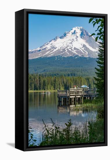 Fishing on Trillium Lake with Mount Hood, part of the Cascade Range, reflected in the still waters,-Martin Child-Framed Premier Image Canvas