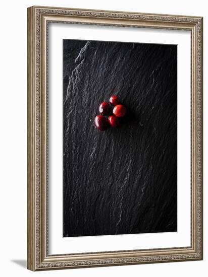 Five Cranberries Clustered In One Spot On Slate Background With Plenty Of Negative Space For Copy-Shea Evans-Framed Photographic Print