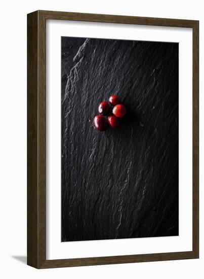 Five Cranberries Clustered In One Spot On Slate Background With Plenty Of Negative Space For Copy-Shea Evans-Framed Photographic Print