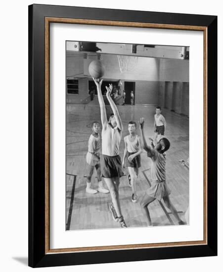 Five Young Boys Wearing Gym Clothes and Playing a Game of Basketball in the School Gym-null-Framed Photographic Print