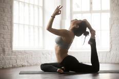 Young Woman Practicing Yoga, Stretching in One Legged King Pigeon Exercise, Eka Pada Rajakapotasana-fizkes-Photographic Print