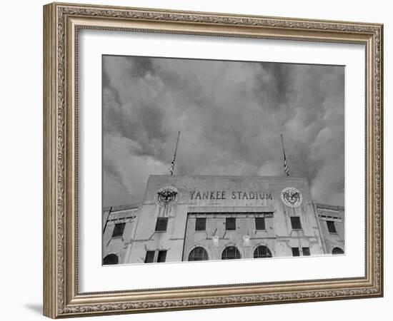 Flags Flying at Half Mast on Top of Yankee Stadium to Honor Late Baseball Player Babe Ruth-Cornell Capa-Framed Photographic Print