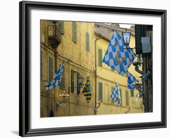 Flags of the Onda (Wave) Contrada in the Via Giovanni Dupre, Siena, Tuscany, Italy, Europe-Ruth Tomlinson-Framed Photographic Print