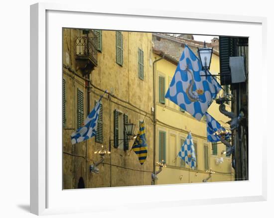 Flags of the Onda (Wave) Contrada in the Via Giovanni Dupre, Siena, Tuscany, Italy, Europe-Ruth Tomlinson-Framed Photographic Print