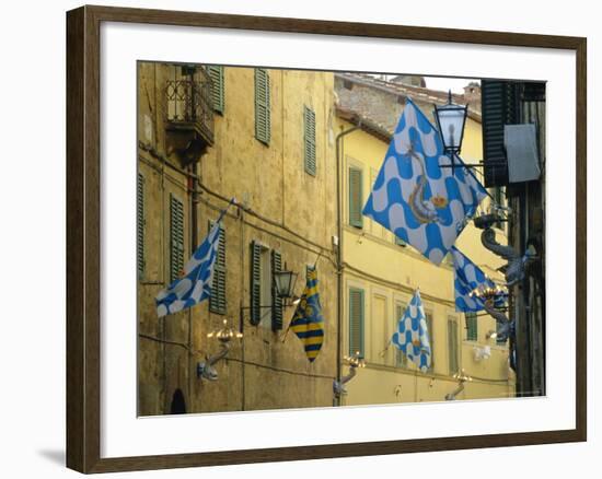 Flags of the Onda (Wave) Contrada in the Via Giovanni Dupre, Siena, Tuscany, Italy, Europe-Ruth Tomlinson-Framed Photographic Print