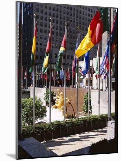 Flags Outside the Rockefeller Center, New York City, New York, USA-Walter Rawlings-Mounted Photographic Print