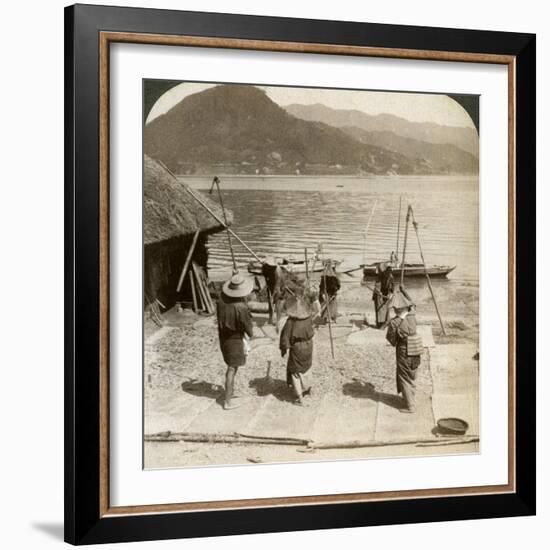 Flailing Barley Beside a Fishing Beach on the Inland Sea, Japan, 1904-Underwood & Underwood-Framed Photographic Print