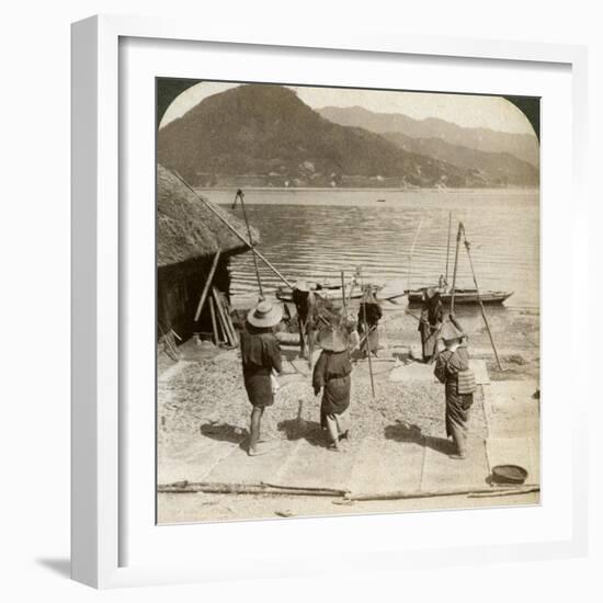 Flailing Barley Beside a Fishing Beach on the Inland Sea, Japan, 1904-Underwood & Underwood-Framed Photographic Print