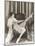Flapper Rolling Up Stockings-null-Mounted Photo