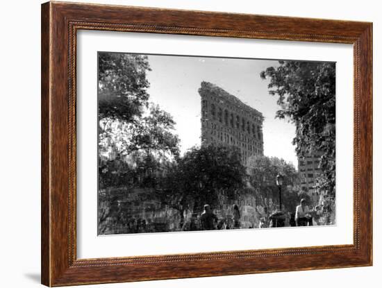 Flatiron Building in NYC Through Reflection in Fountain in Madison Sq. Park-null-Framed Photo