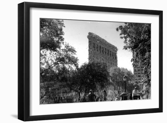 Flatiron Building in NYC Through Reflection in Fountain in Madison Sq. Park-null-Framed Photo