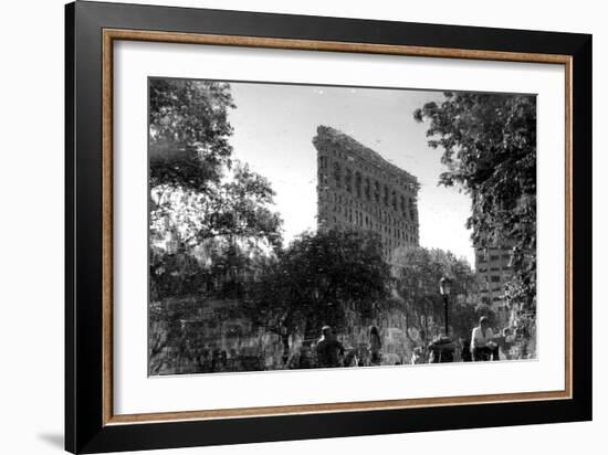 Flatiron Building in NYC Through Reflection in Fountain in Madison Sq. Park-null-Framed Photo