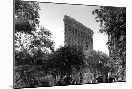 Flatiron Building in NYC Through Reflection in Fountain in Madison Sq. Park-null-Mounted Photo