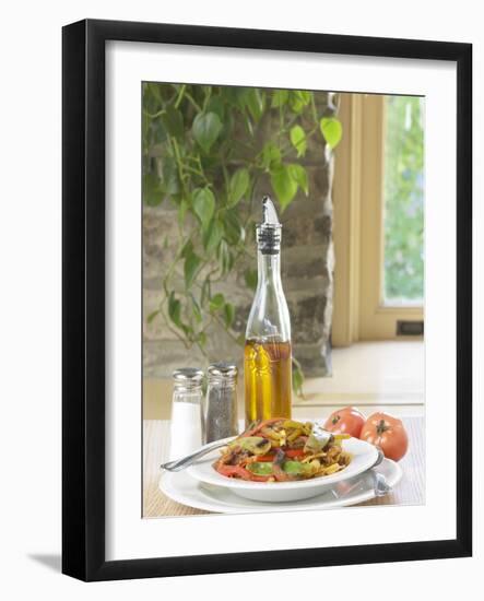Flavored Oil and Salt and Pepper Shakers Beside Bowl of Pasta-null-Framed Photographic Print