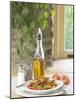 Flavored Oil and Salt and Pepper Shakers Beside Bowl of Pasta-null-Mounted Photographic Print