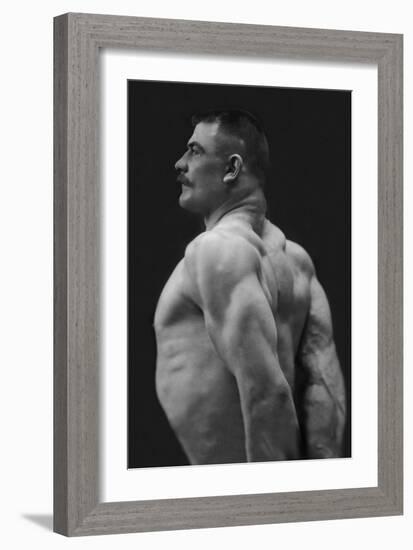 Flexing Triceps, Deltoids, and Trapezius-null-Framed Art Print