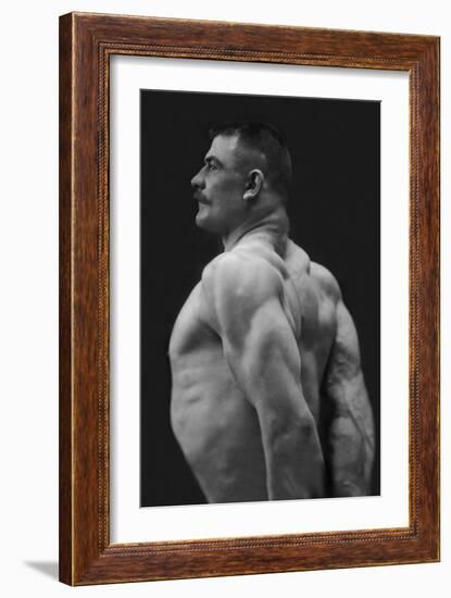 Flexing Triceps, Deltoids, and Trapezius-null-Framed Art Print