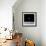 Floating Astronaut-null-Framed Premium Photographic Print displayed on a wall