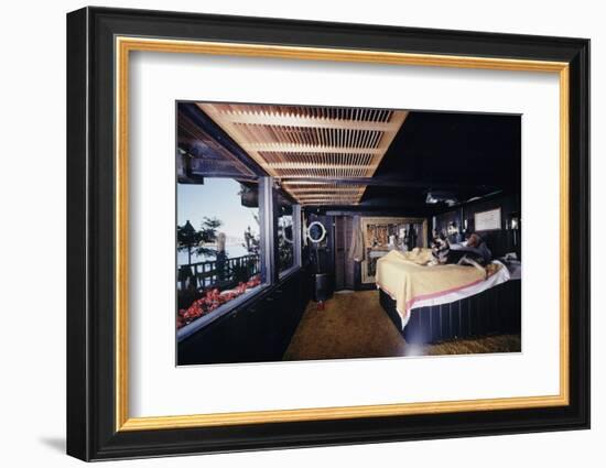 Floating-Home Owner Warren Owen Fonslor in His Bedroom, Sausalito, CA, 1971-Michael Rougier-Framed Photographic Print