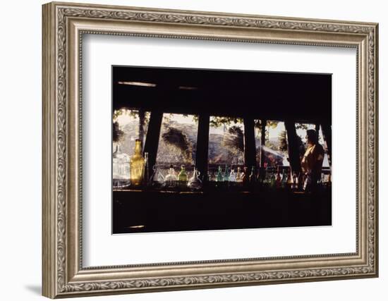 Floating-Home Owner Warren Owen Fonslor Watering the Hanging Plants, Sausalito, CA, 1971-Michael Rougier-Framed Photographic Print