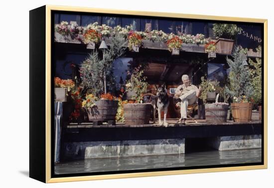 Floating-Home Owner Warren Owen Fonslor with His German Shepherd, Sausalito, CA, 1971-Michael Rougier-Framed Premier Image Canvas