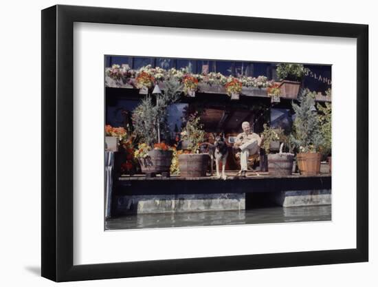 Floating-Home Owner Warren Owen Fonslor with His German Shepherd, Sausalito, CA, 1971-Michael Rougier-Framed Photographic Print