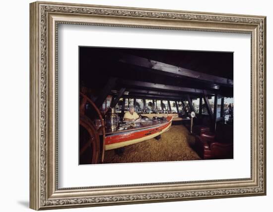 Floating-Home Owner Warren Owen Fonslor Works at a Desk in His Office, Sausalito, CA, 1971-Michael Rougier-Framed Photographic Print