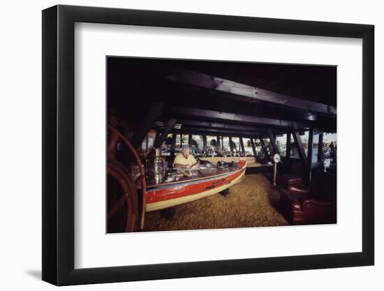 Floating-Home Owner Warren Owen Fonslor Works at a Desk in His Office, Sausalito, CA, 1971-Michael Rougier-Framed Photographic Print